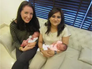 IVF success story – proud mothers with twin babies.